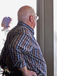 Stu pensively looking out the window