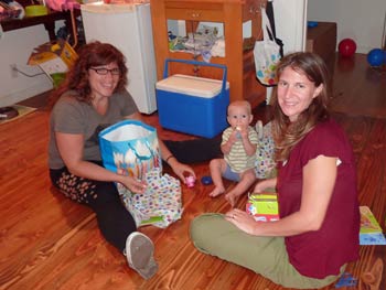 Danielle, Olivia & Caleb opening presents