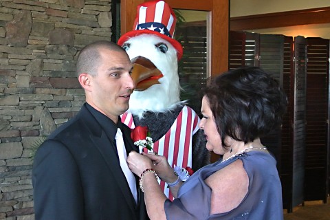 Chris getting button-holed by his mother