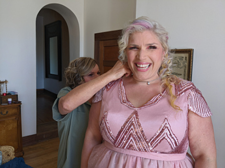 Patty applying finishing touches to her daughter