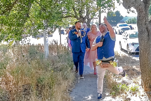 Parade: Flower Brian leads the happy couple