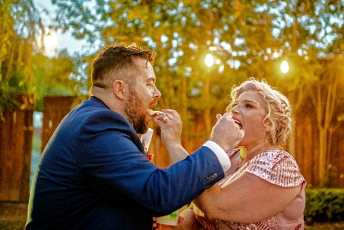 Andy & Dani feeding each other desert