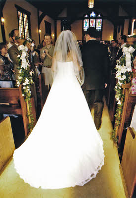 Craig escorts Julie down the aisle