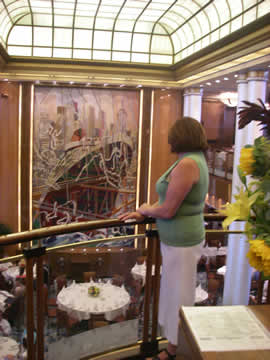 Patty looking over the two floor dining room