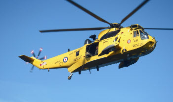 rescue helicopter arriving at the ship