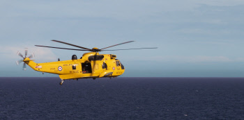 rescue helicopter leaving the ship
