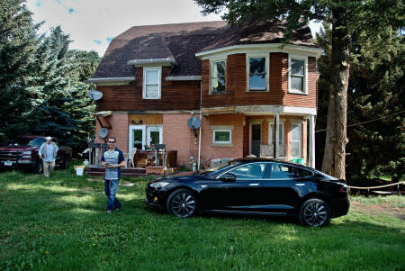 Frank & Ross in front of home