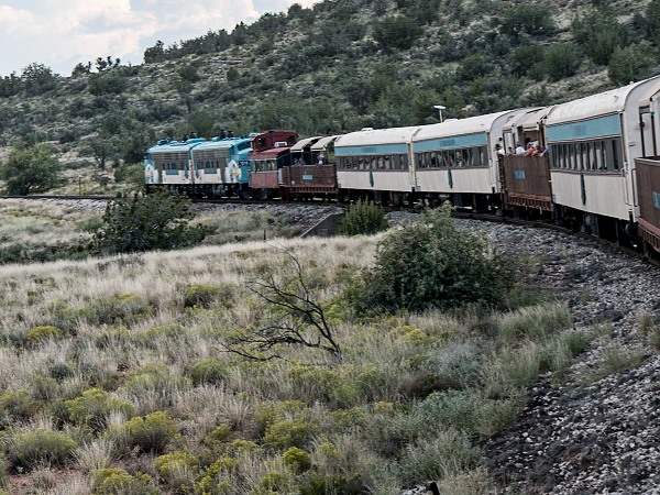 two engines with a caboose
