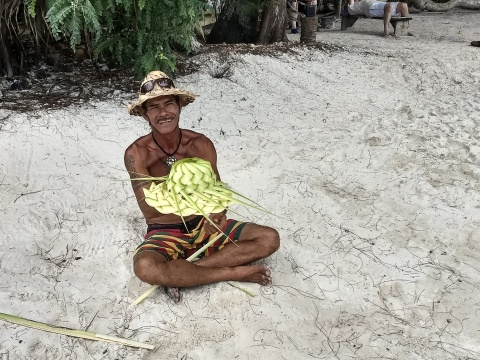 Making hats & ties from fronds