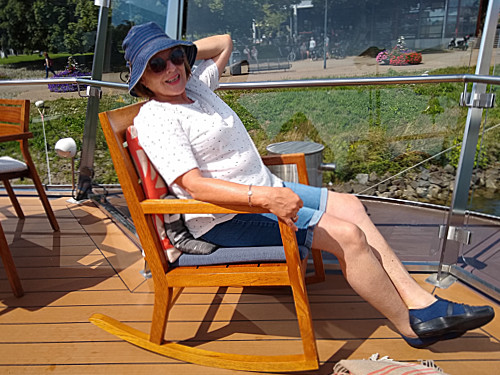 Patty relaxing in a rocking chair