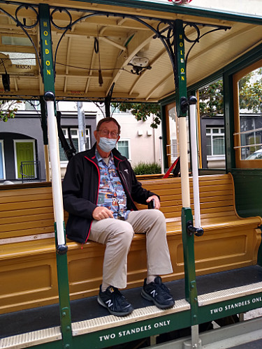 Craig getting on trolley at Mason Street