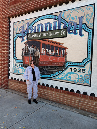 Patty in front of Hannibal banner